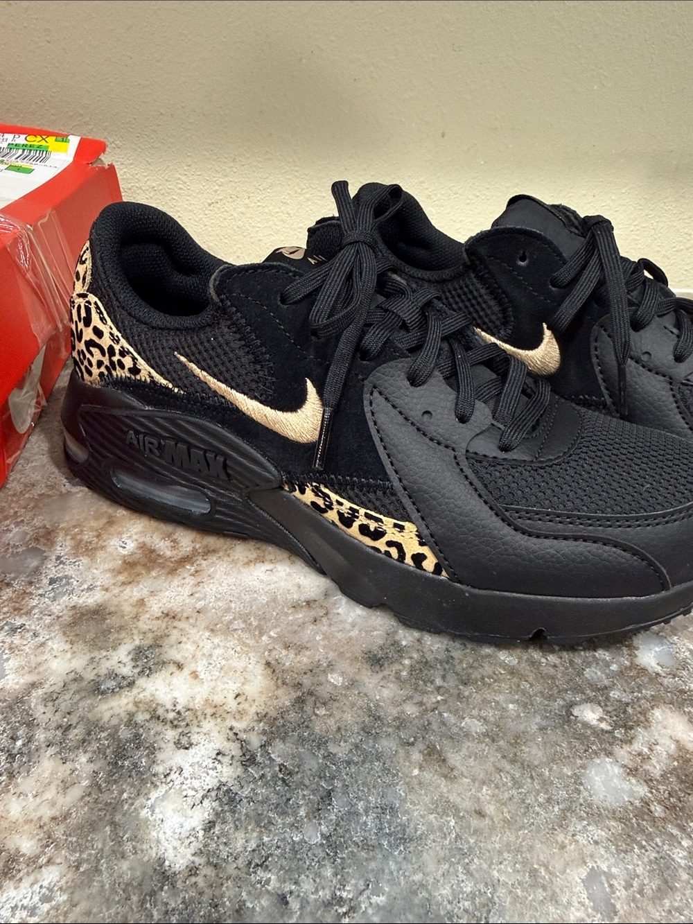 Nike Women’s Black Sneakers with Leopard Print & Gold Swoosh